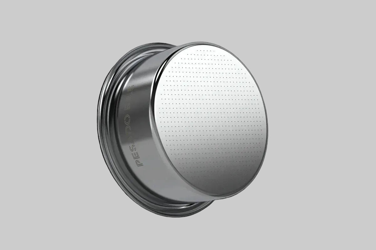 Silver button with textured surface on a black background